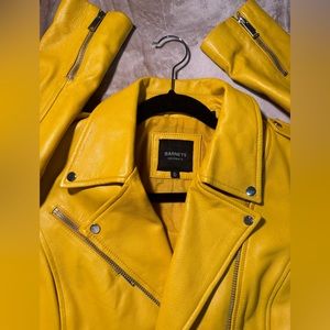 Barneys New York mustard yellow bike jacket.